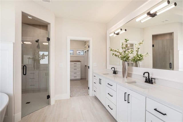 2317 SW Morris Dr, Lees Summit, MO 64082 - full bathroom with double vanity and a stall shower