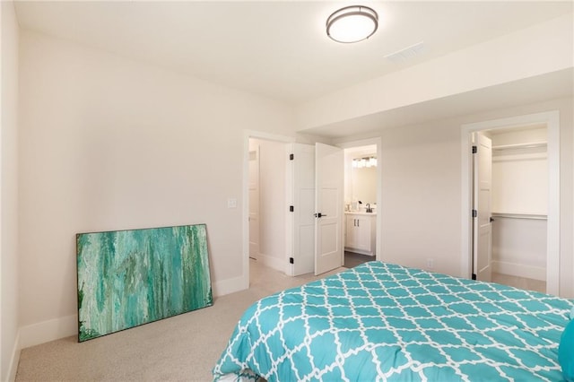 2317 SW Morris Dr, Lees Summit, MO 64082 - bedroom featuring carpet floors and ensuite bath