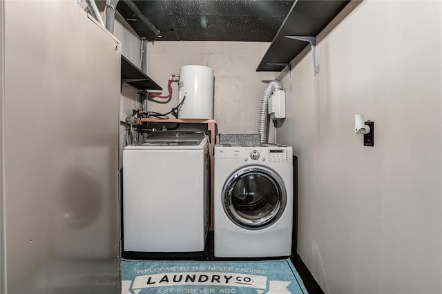 134 Timber Valley Dr, Linn Valley, KS 66040 - laundry room with laundry area, water heater, and washing machine and clothes dryer