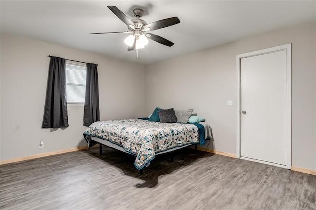 134 Timber Valley Dr, Linn Valley, KS 66040 - bedroom featuring baseboards and wood finished floors