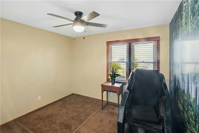 office area featuring baseboards, a ceiling fan, and carpet floors