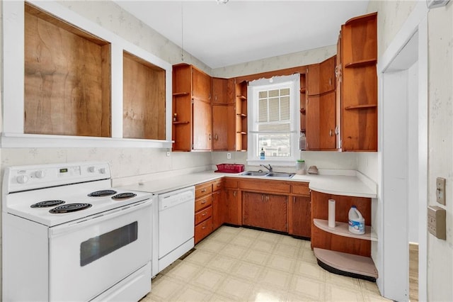 208 E 5th St, Carrollton, MO 64633 - kitchen with open shelves, a sink, white appliances, light countertops, and light floors