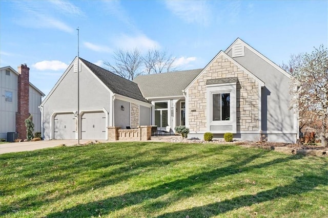 view of front facade featuring a front yard, stone siding, a garage, stucco siding, and driveway