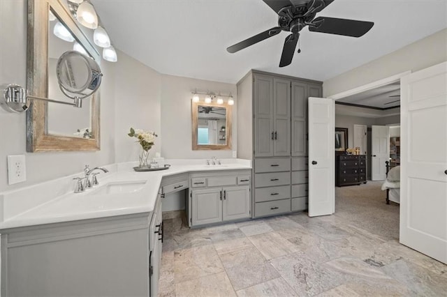 bathroom featuring double vanity, a sink, and a ceiling fan