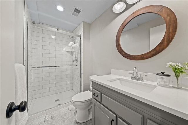 bathroom featuring vanity, visible vents, recessed lighting, toilet, and a stall shower