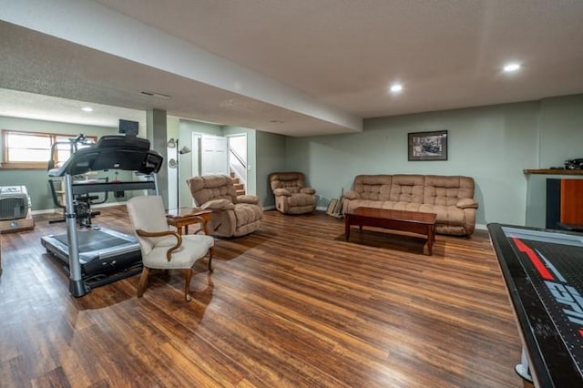 6620 NW 136th St, Kansas City, MO 64164 - living area featuring baseboards, recessed lighting, wood finished floors, and stairs
