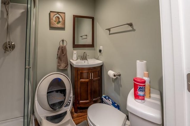 6620 NW 136th St, Kansas City, MO 64164 - bathroom featuring toilet, a shower with shower door, and vanity