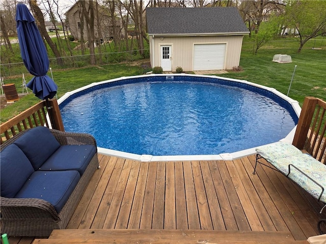 6620 NW 136th St, Kansas City, MO 64164 - outdoor pool with a lawn, an outbuilding, and a deck