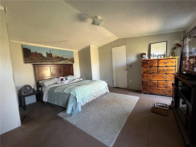 bedroom with ornamental molding, vaulted ceiling, and a textured ceiling