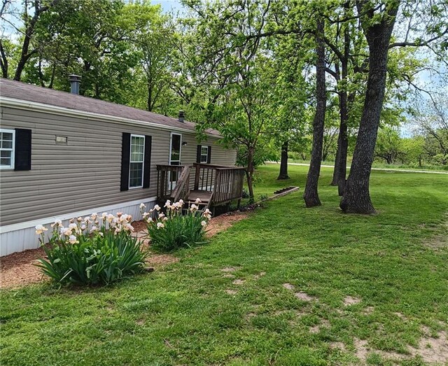 3672 Haynes Hill Rd, Bates City, MO 64011 - view of grassy yard featuring a deck