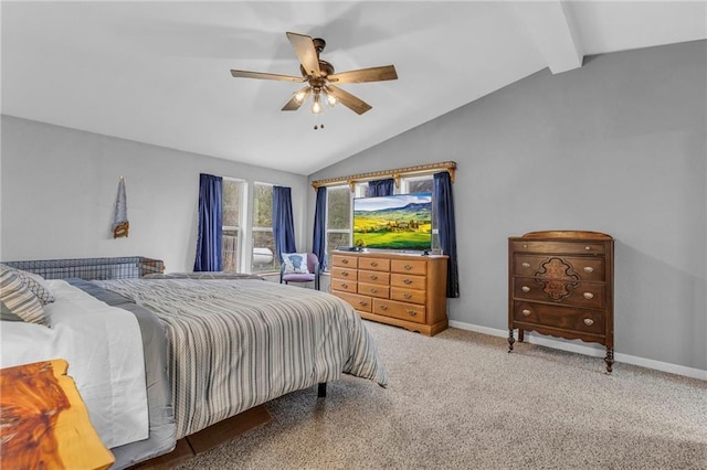 carpeted bedroom featuring vaulted ceiling with beams, baseboards, and a ceiling fan