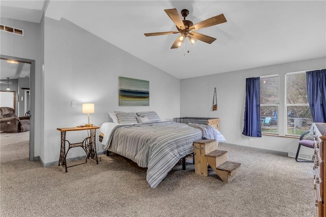 bedroom with baseboards, visible vents, carpet, lofted ceiling, and ceiling fan