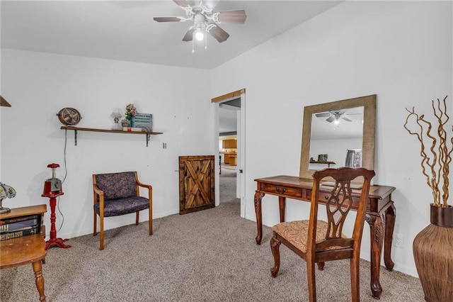 living area with light carpet, baseboards, and ceiling fan