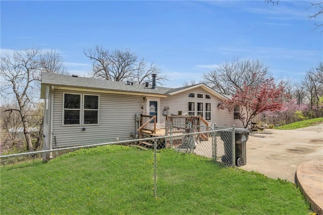 back of property featuring a yard and fence private yard