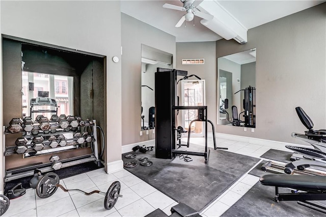 exercise room featuring tile patterned flooring, ceiling fan, and baseboards