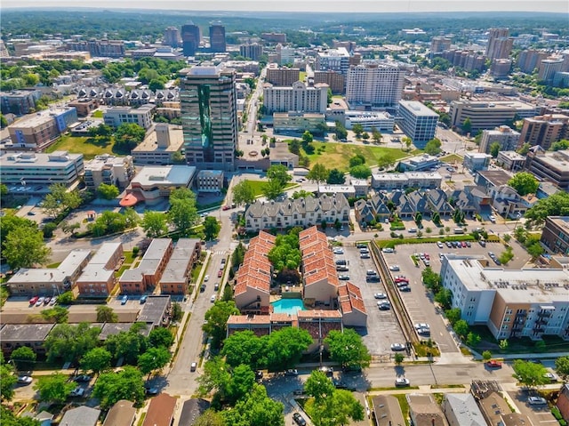 birds eye view of property featuring a view of city