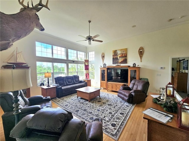 528 W End Cir, Osage Beach, MO 65065 - living area featuring ornamental molding, ceiling fan, and light wood finished floors