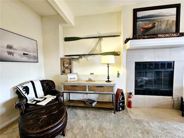 528 W End Cir, Osage Beach, MO 65065 - living area featuring carpet floors and a tiled fireplace