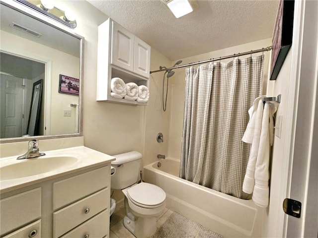 528 W End Cir, Osage Beach, MO 65065 - bathroom with a textured ceiling, shower / bath combo, toilet, vanity, and tile patterned floors