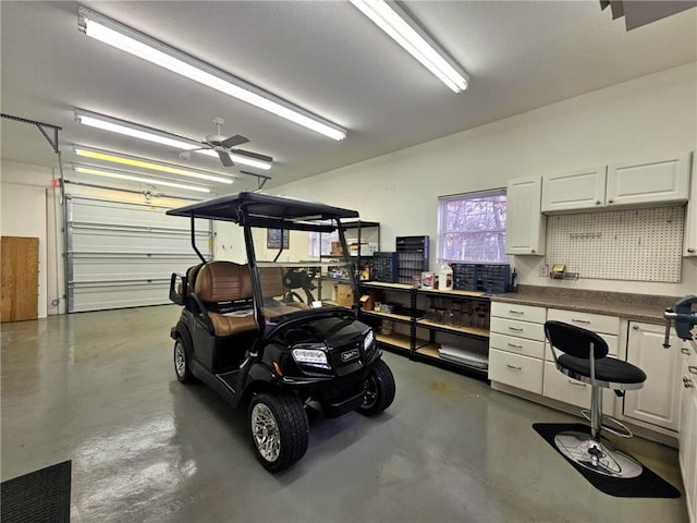 528 W End Cir, Osage Beach, MO 65065 - garage featuring ceiling fan