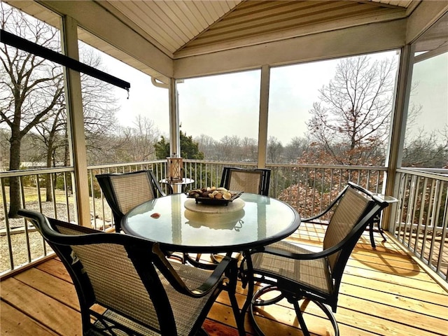 528 W End Cir, Osage Beach, MO 65065 - sunroom with outdoor dining area, lofted ceiling, and healthy amount of natural light