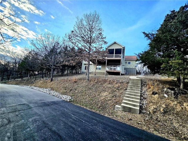 528 W End Cir, Osage Beach, MO 65065 - view of front of home with stairs