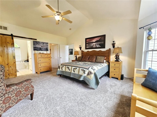 528 W End Cir, Osage Beach, MO 65065 - bedroom featuring lofted ceiling, carpet flooring, a barn door, ensuite bathroom, and ceiling fan
