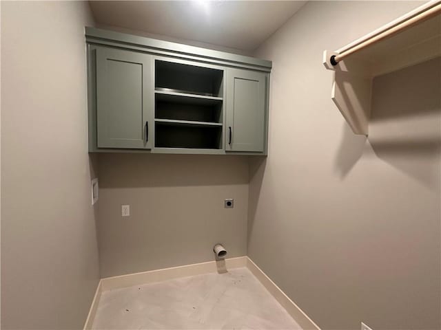 2005 Foxtail Pt, Kearney, MO 64060 - laundry area with hookup for an electric dryer and cabinet space