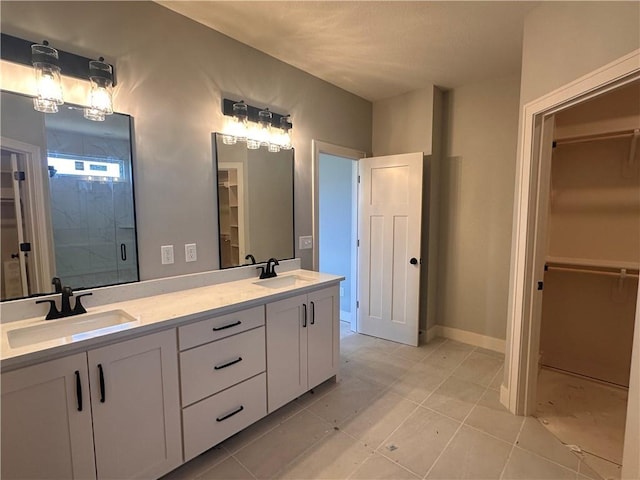 2005 Foxtail Pt, Kearney, MO 64060 - full bath with a walk in closet, double vanity, a stall shower, and tile patterned floors