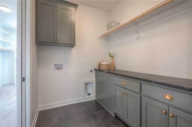 laundry room with baseboards, cabinet space, washer hookup, and hookup for an electric dryer