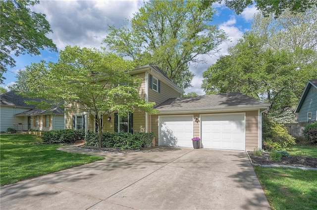 10312 Lamar Ave, Overland Park, KS 66207 - view of front of home featuring a garage, concrete driveway, and a front lawn