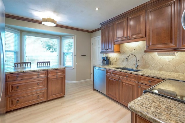 10312 Lamar Ave, Overland Park, KS 66207 - kitchen featuring dishwasher, a sink, baseboards, light wood-type flooring, and crown molding