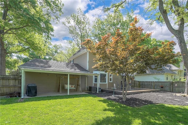 10312 Lamar Ave, Overland Park, KS 66207 - back of property featuring a patio area and central air condition unit