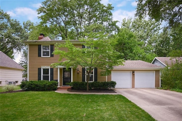 10312 Lamar Ave, Overland Park, KS 66207 - colonial inspired home featuring driveway, an attached garage, a chimney, and a front lawn