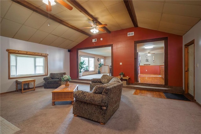 living room with carpet floors, ceiling fan, visible vents, and lofted ceiling with beams