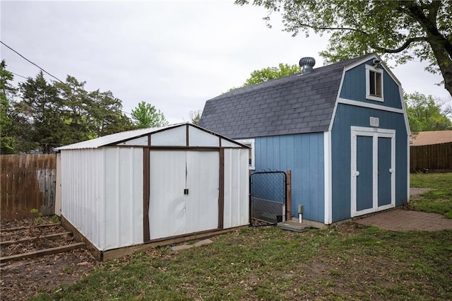 view of shed featuring a fenced backyard