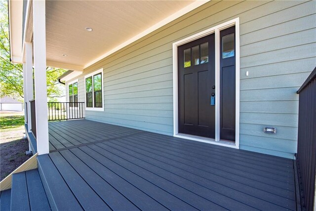 deck featuring covered porch
