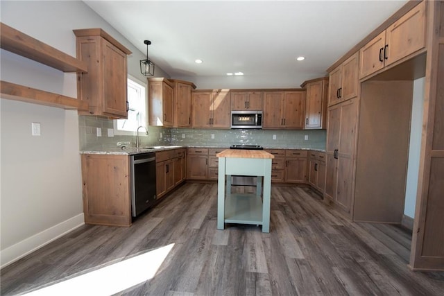 kitchen featuring decorative backsplash, dark wood-style flooring, open shelves, stainless steel microwave, and dishwashing machine
