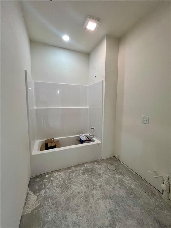 full bathroom with a tub