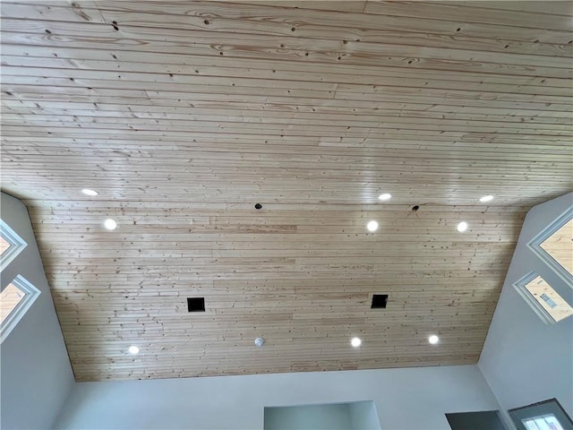 interior details featuring wood ceiling and recessed lighting