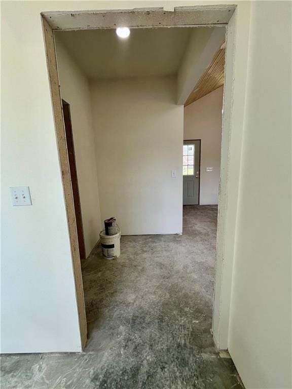hall with concrete floors