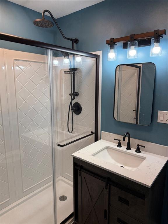 1020 Francis St, Lexington, MO 64067 - bathroom with a shower stall and vanity