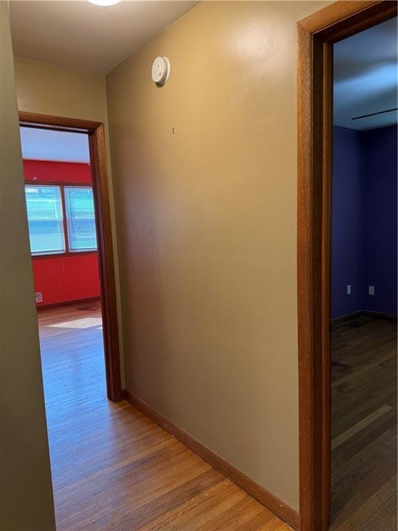 1020 Francis St, Lexington, MO 64067 - hall featuring baseboards and wood finished floors