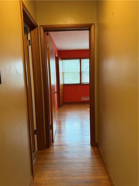1020 Francis St, Lexington, MO 64067 - hall featuring baseboards and wood finished floors