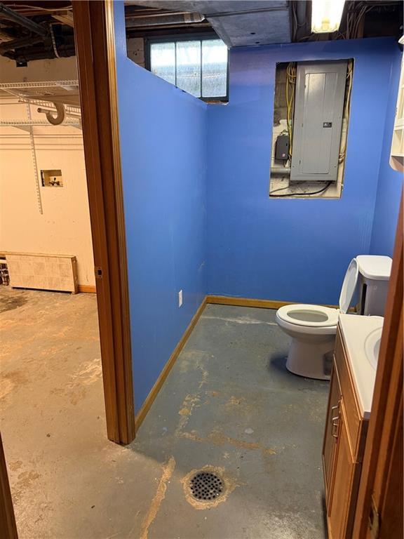 1020 Francis St, Lexington, MO 64067 - basement featuring electric panel and baseboards