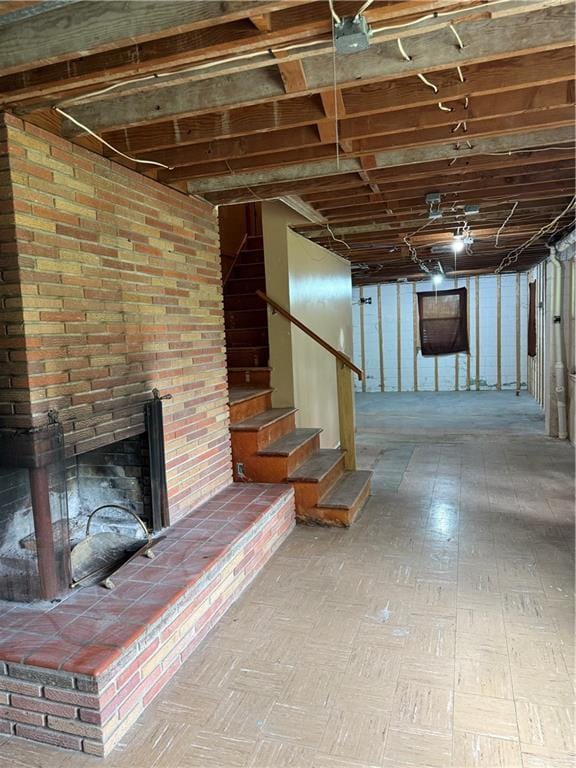 1020 Francis St, Lexington, MO 64067 - below grade area featuring a fireplace and stairs
