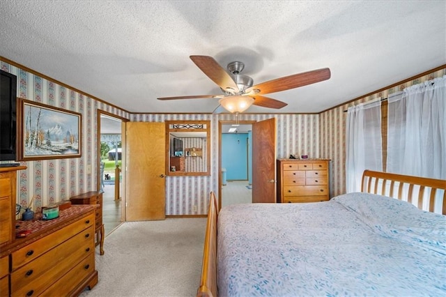 bedroom with light carpet, wallpapered walls, crown molding, and a textured ceiling
