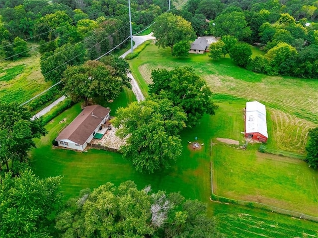 birds eye view of property featuring a rural view