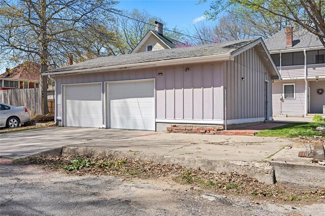 garage featuring fence