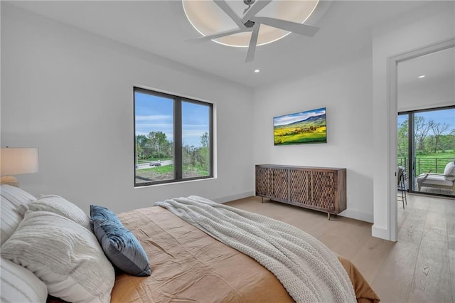 bedroom featuring light wood-style floors, ceiling fan, recessed lighting, and baseboards